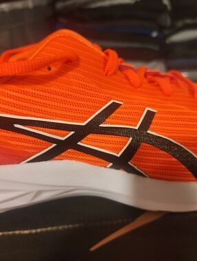 Asics Bright Orange Running Sneaker with Black Logo